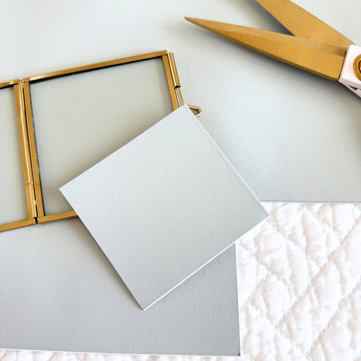 cut paint sheet for background of frame