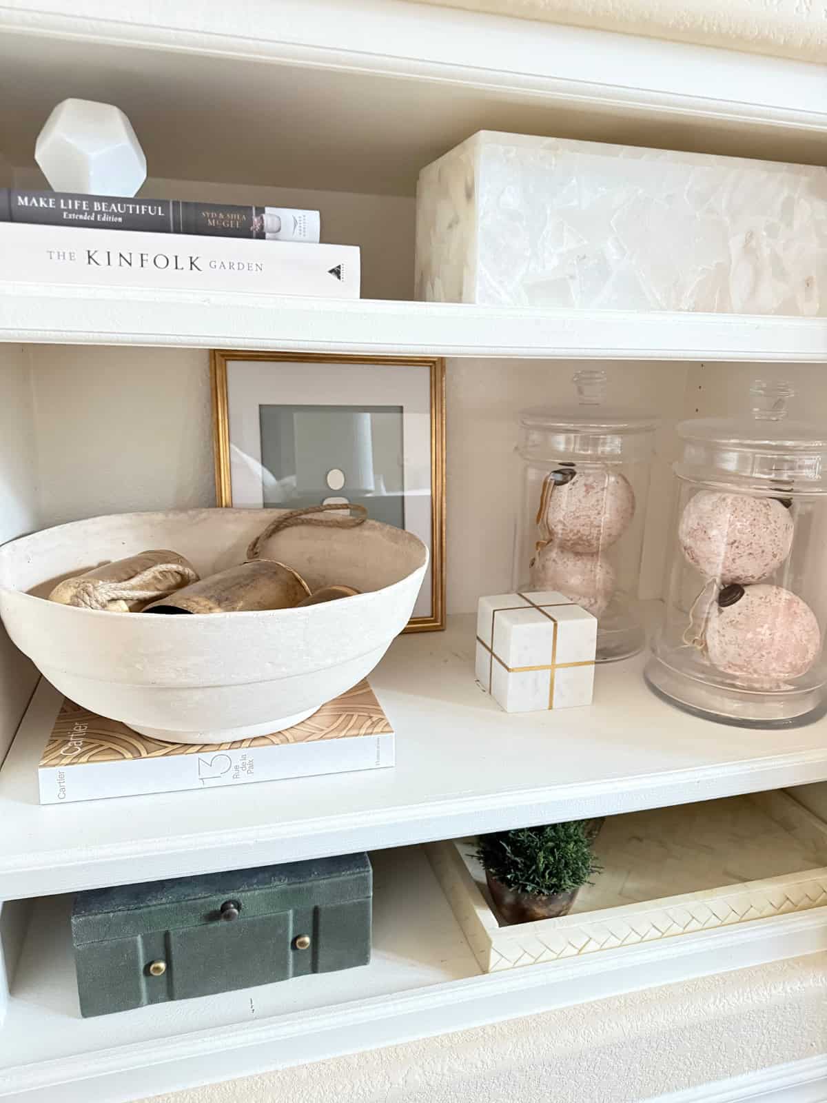 shelves styled with various decor