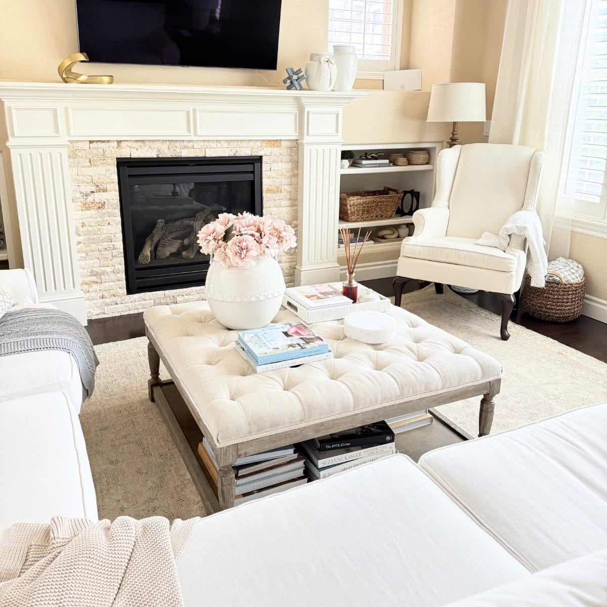 ottoman styled with books and decor