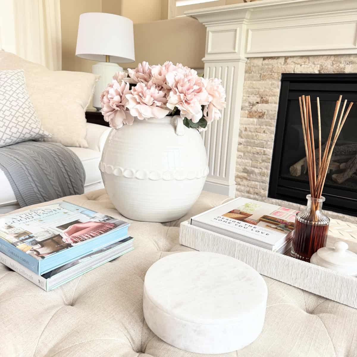 books and decor styled on an ottoman