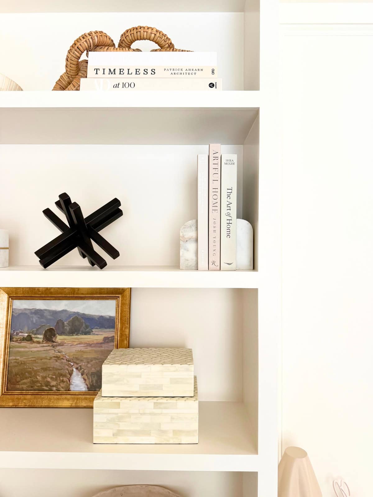 built-in shelves styled with various decor