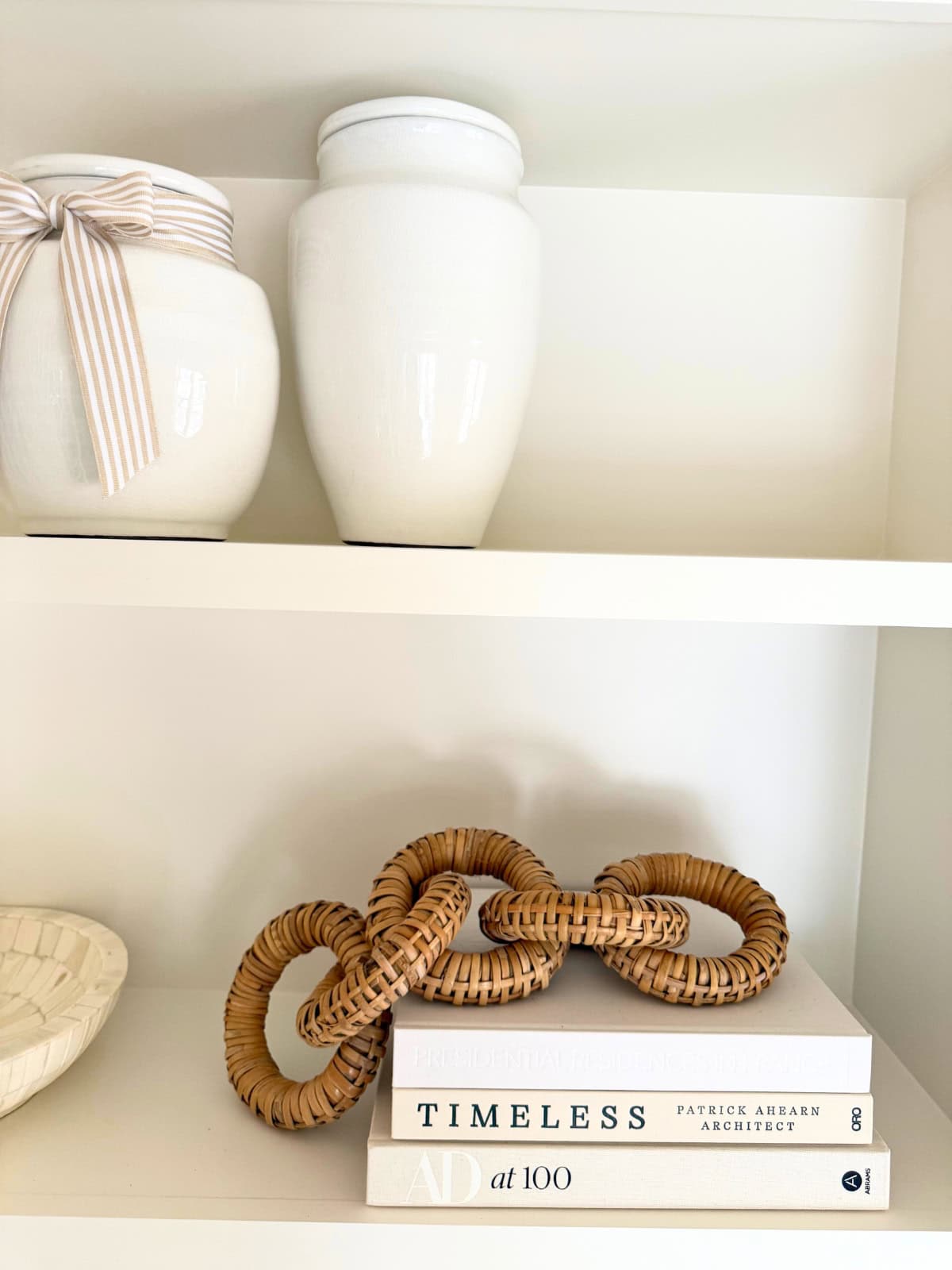 shelves styled with vases and books and other decor