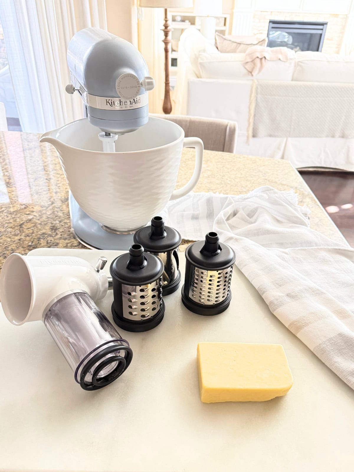 supplies and ingredients to shred cheese in kitchenaid stand mixer