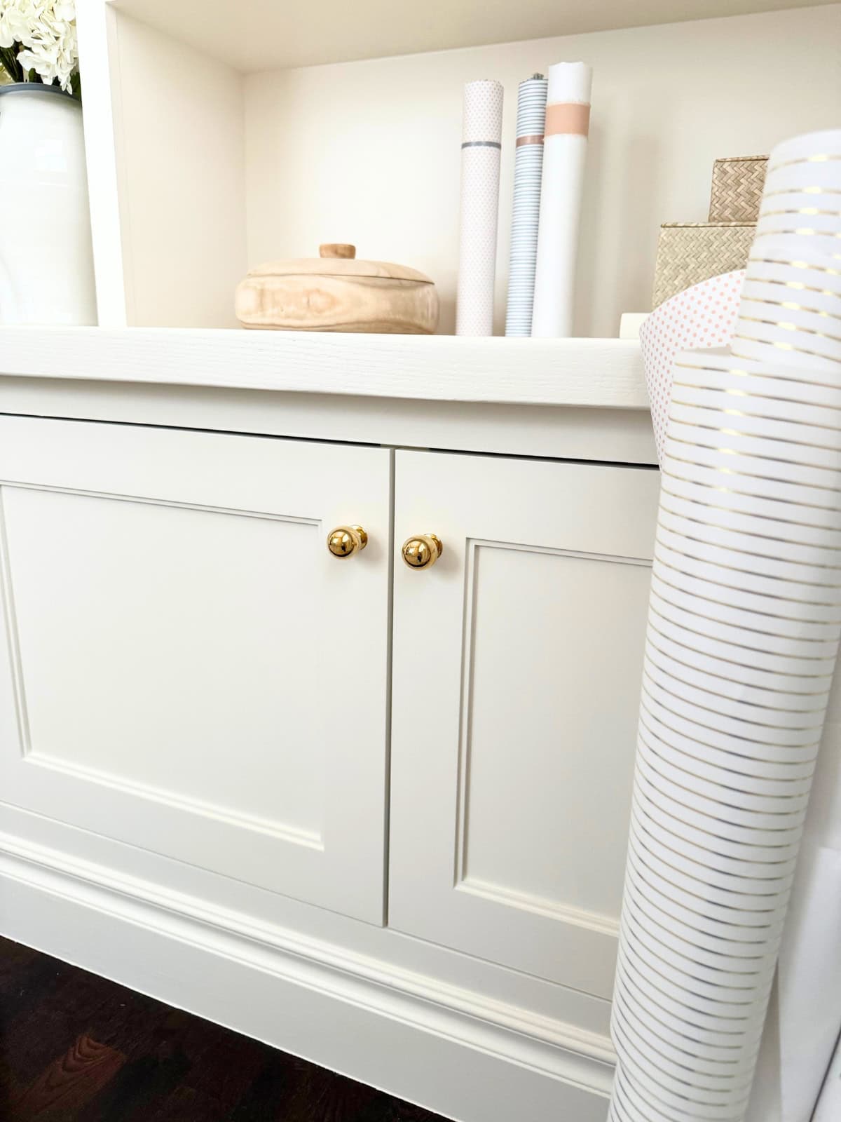 white cabinet doors with unlacquered brass cabinet ball knobs