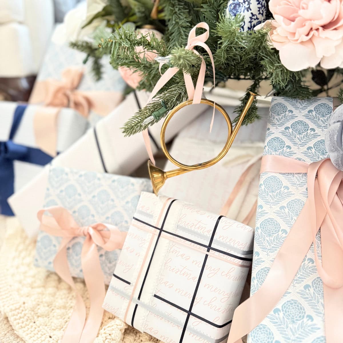 brass french horn christmas ornament styled on tree