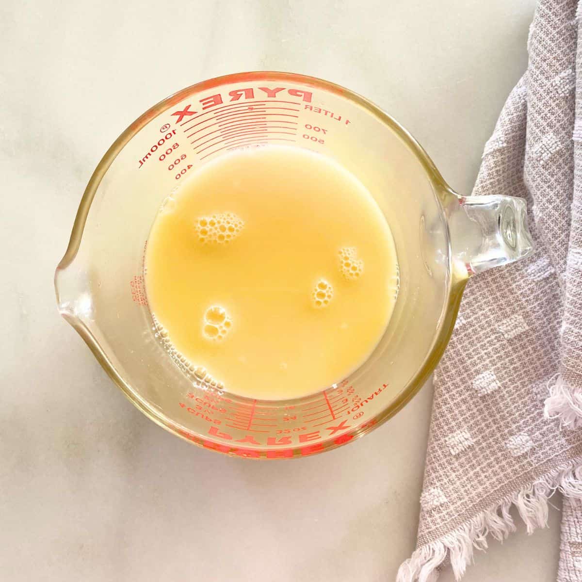 whisked eggs in mixing bowl