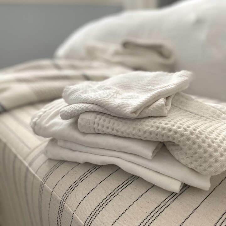Stack of white cotton cleaning cloths