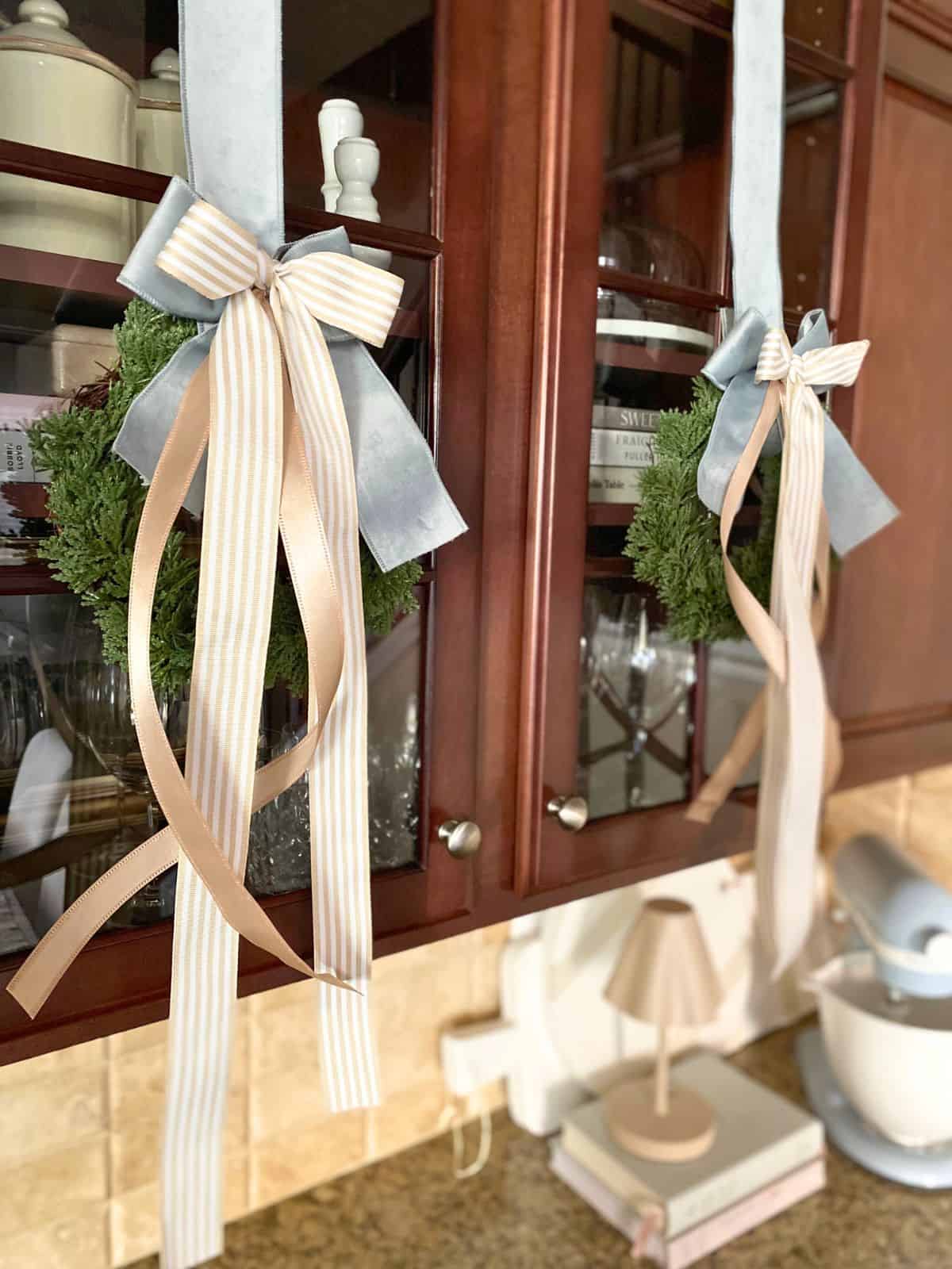 wreaths on kitchen cabinet doors